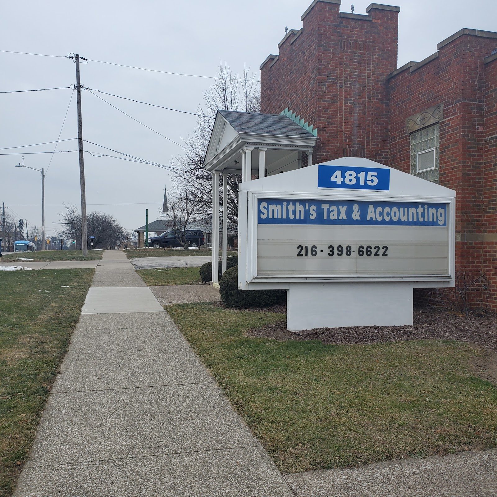 Wayne E Smith Tax Services sign and office at 4815 Broadview Rd, Cleveland, OH